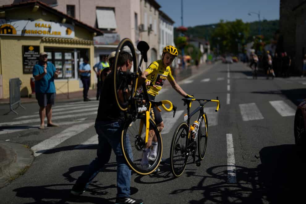 Jonas Vingegaard crashed in the yellow jersey on a day when he lost two team-mates (Thibault Camus/AP)