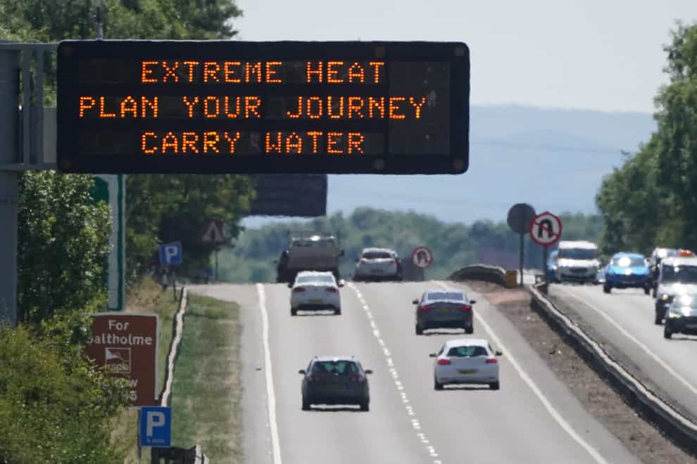 A matrix sign over the A19 road towards Teesside displays an extreme weather advisory as the UK braces for the upcoming heatwave (Owen Humphreys/PA)