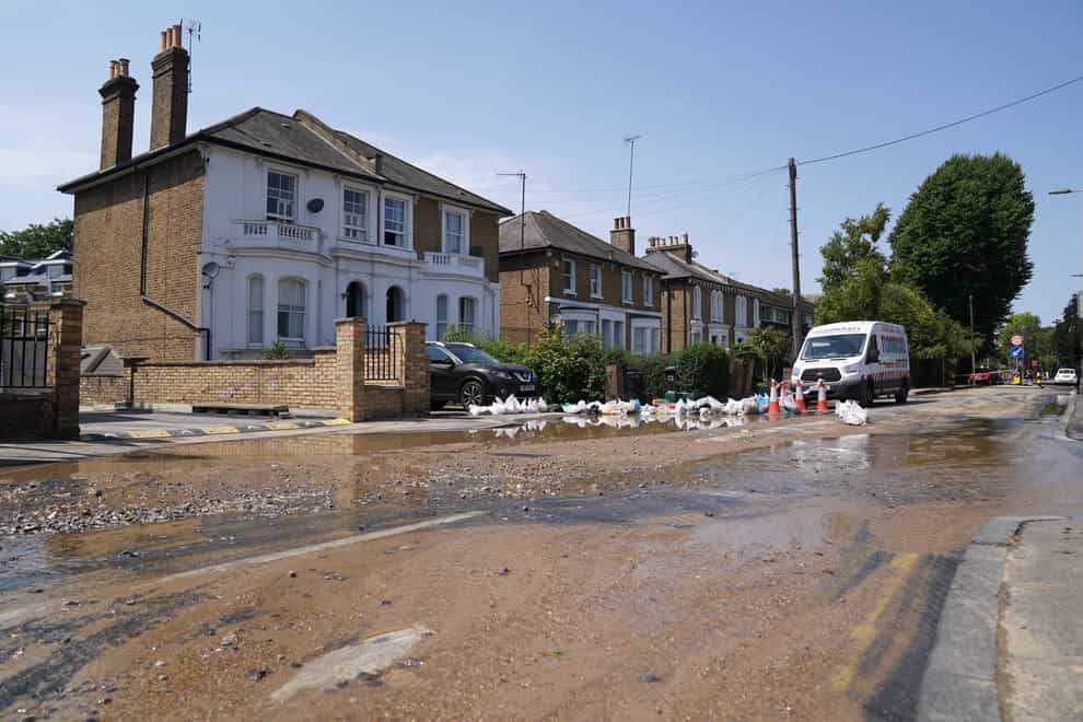 The aftermath on Queens Road, Kingston upon Thames after a burst water main flooded streets (Kirsty O’Connor/PA)