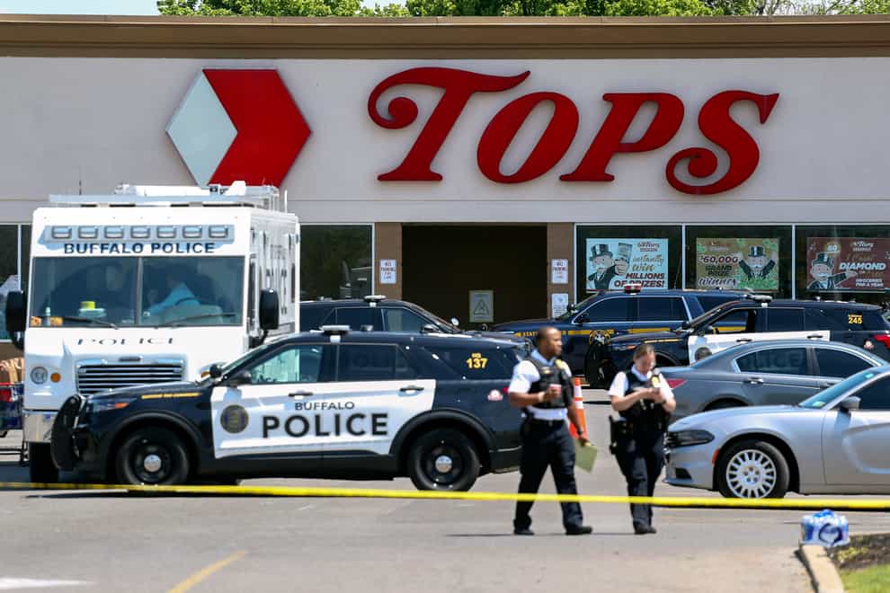 Police outside Tops supermarket (Joshua Bessex/AP)