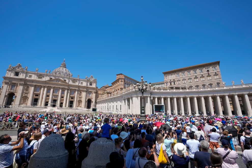 People crowd St Peter’s Square at the Vatican (Andrew Medichini/AP/PA)