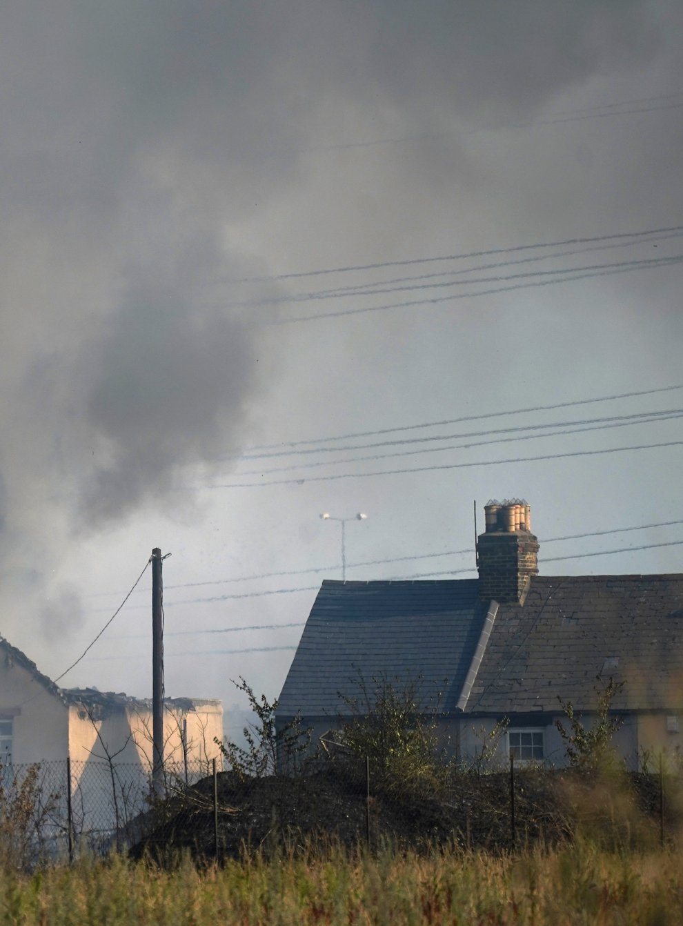The major a blaze in the village of Wennington, east London. (Yui Mok/PA)