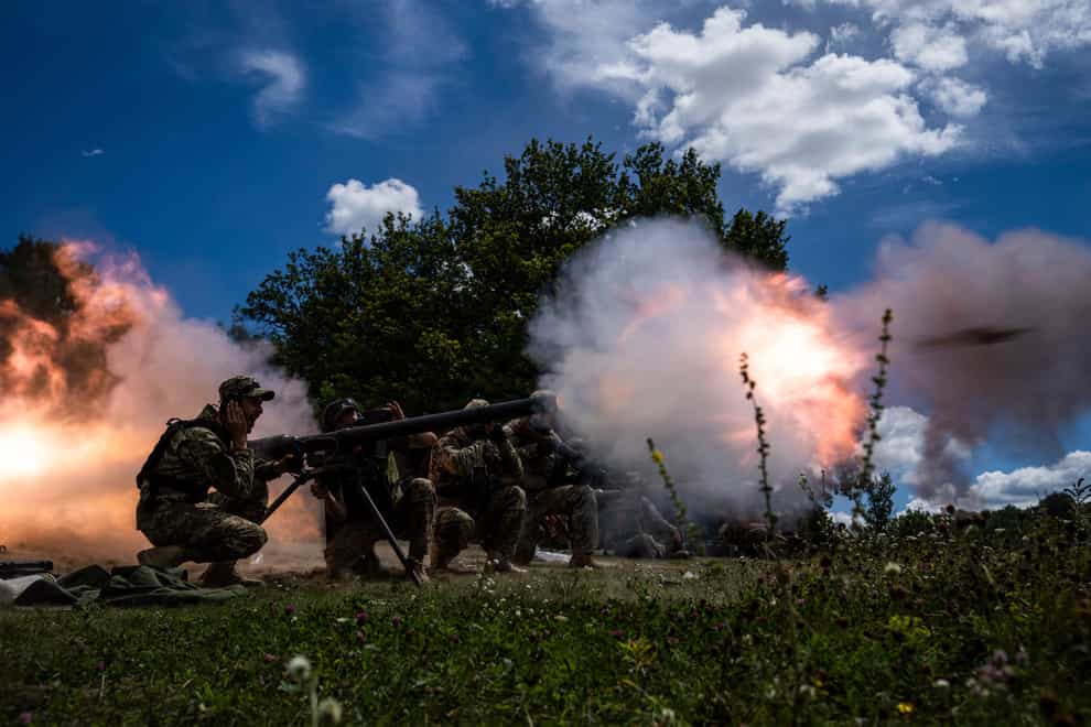 Ukrainian servicemen during training in the Kharkiv region of Ukraine (Evgeniy Maloletka/AP)