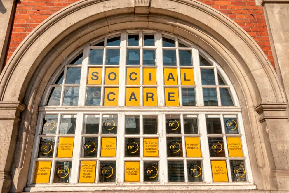 Social Care jobs listed in a window display (UrbanImages/Alamy/PA)