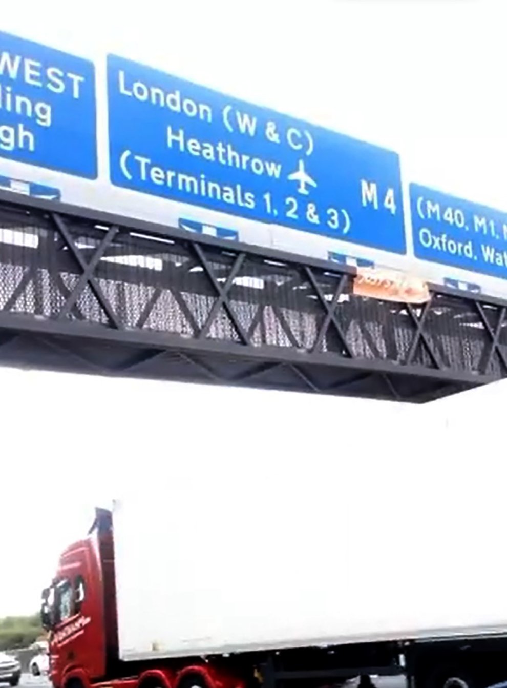 Just Stop Oil activists climbed motorway signs on the M25 (handout/PA)