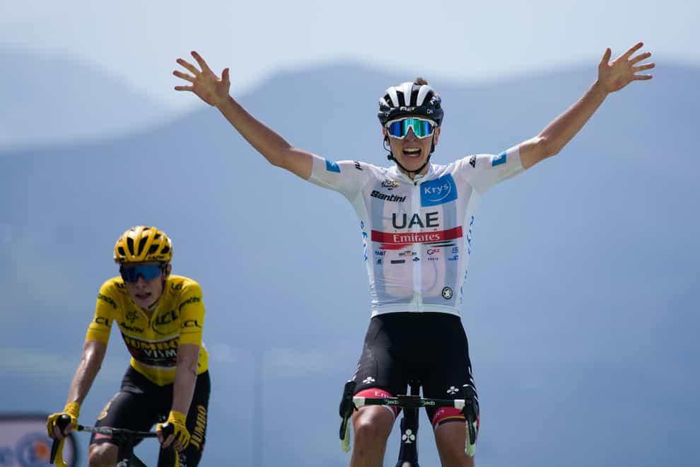 Tadej Pogacar beat Jonas Vingegaard to the stage win in a battle of the Tour’s top two (Daniel Cole/AP)