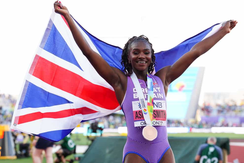Great Britain’s Dina Asher-Smith celebrates with her bronze medal in Eugene. (Martin Rickett/PA)
