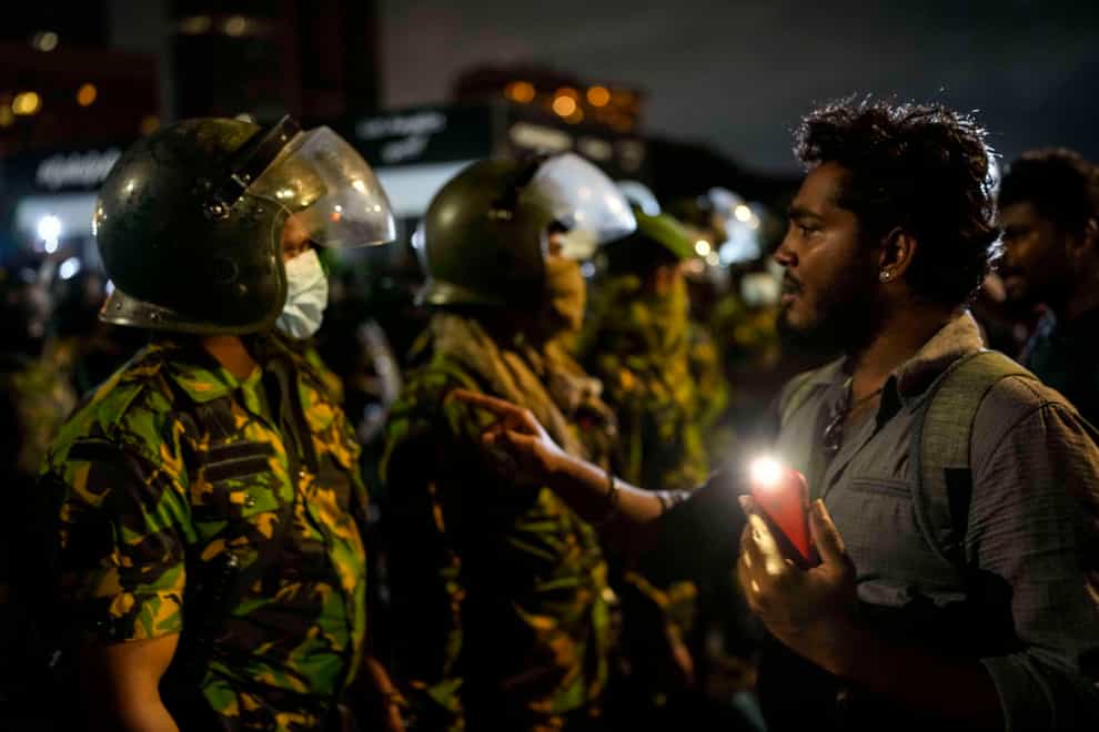 An ally of the Rajapaksa political family was appointed as Sri Lanka’s new prime minister, hours after security forces cleared the main protest site occupied for months by demonstrators (Rafiq Maqbool/AP)