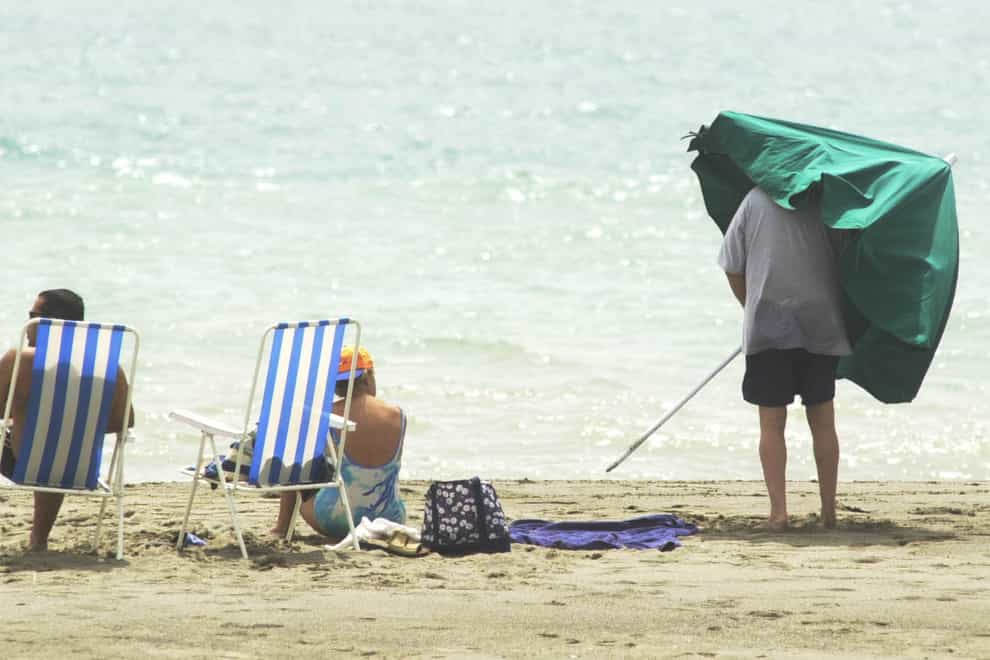 Tourists in Torremolinos on the Costa Del Sol (Stefan Rousseau/PA)