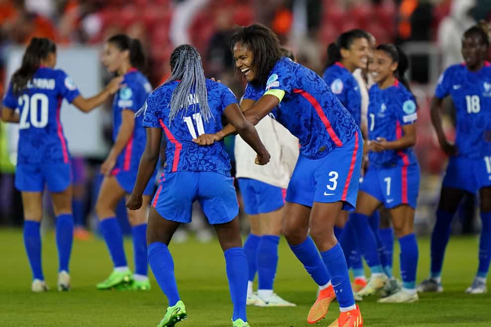 France’s Kadidiatou Diani, left, and Wendie Renard celebrate victory over the Netherlands (Tim Goode/PA)