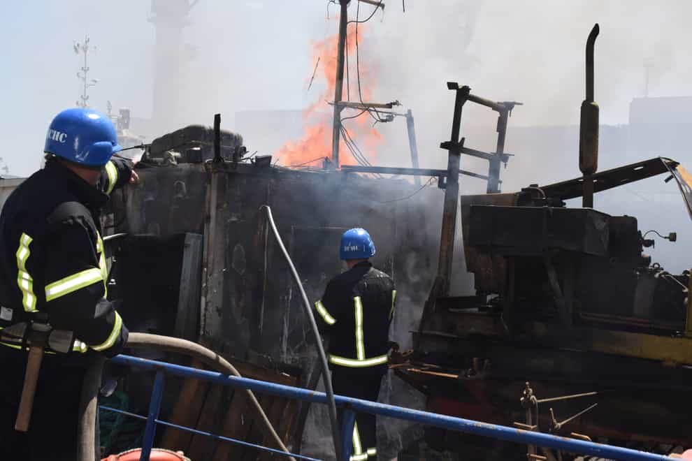 Firefighters put out a blaze caused by the Russian missile attack in Odesa (Odesa City Hall Press Office/AP)