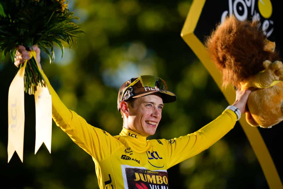 Jonas Vingegaard celebrates winning the Tour de France (Daniel Cole/AP)
