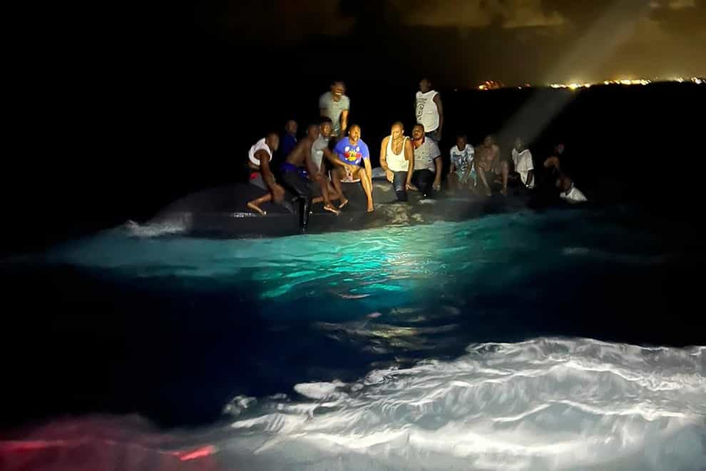 A boat carrying Haitian migrants apparently capsized off the Bahamas early on Sunday, and Bahamian security forces recovered the bodies of 17 people and rescued 25 others, authorities said (Royal Bahamas Defense Force/AP)