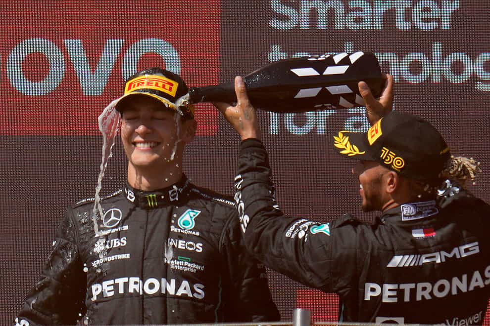 Lewis Hamilton (right) finished runner-up in his 300th Formula One race (Manu Fernandez/AP)