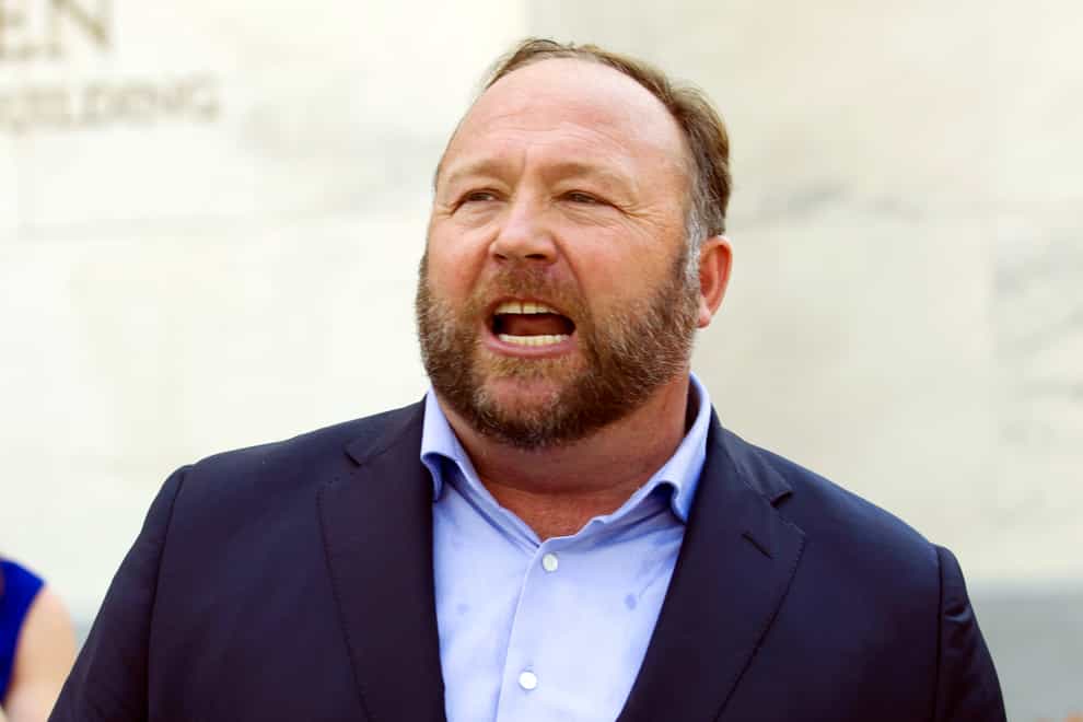 FILE – Infowars host Alex Jones speaks outside of the Dirksen building on Capitol Hill, Sept. 5, 2018, in Washington. Jones was defiant and cited free speech rights during a deposition in April, as part of a lawsuit by relatives of some of the Sandy Hook Elementary School shooting victims who are suing him for calling the massacre a hoax, according to court documents released Thursday, July 14, 2022. (AP Photo/Jose Luis Magana, File)