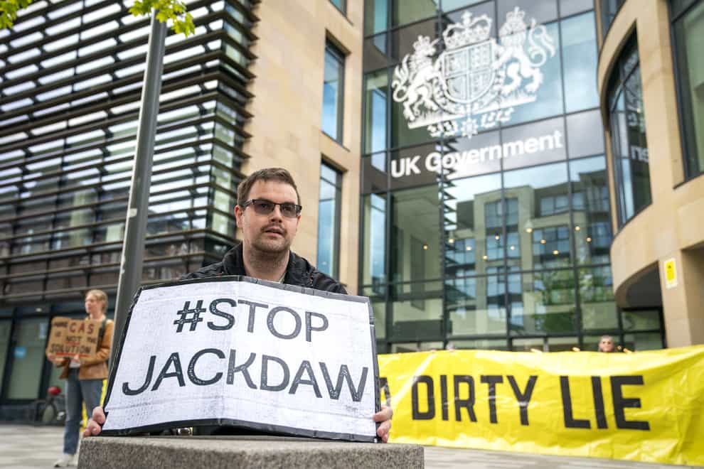 Environmental campaigners from Friends of the Earth protest outside the UK Government building in Edinburgh. Greenpeace announced plans to take legal action agains the government. Picture date: Thursday June 2, 2022.
