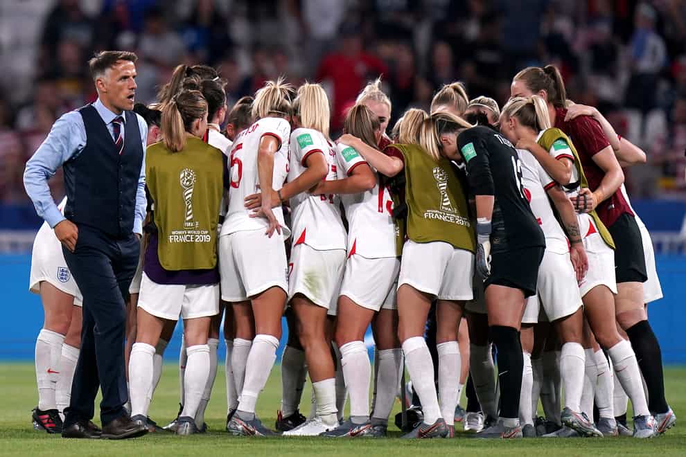 Head coach Phil Neville, left, and his team react after defeat to the United States in the 2019 World Cup semi-final (John Walton/PA)