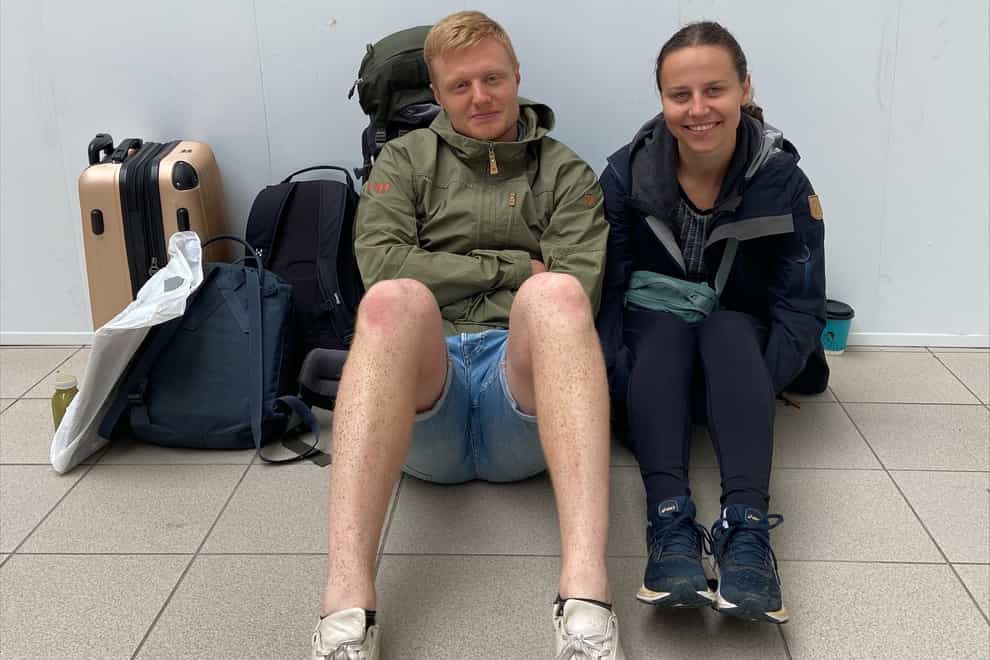Felix Nystrom and Rebecka Ronnegard waiting at Sheffield railway station (Gina Kalsi/PA)