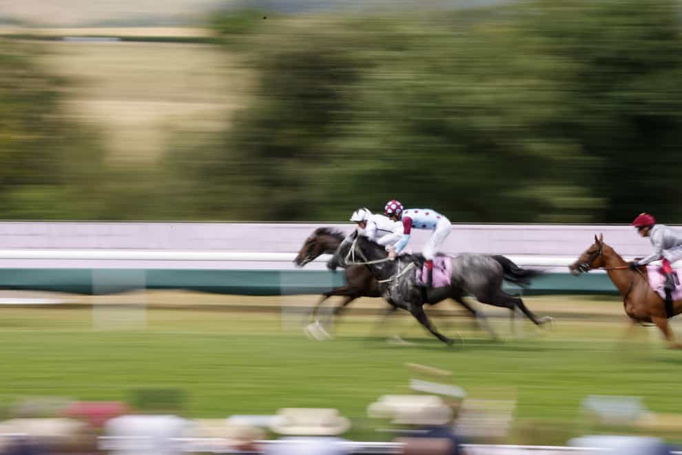 Oscula ridden by jockey William Buick (white cap) on the way to winning the Whispering Angel Oak Tree Stakes on day two of the Qatar Goodwood Festival 2022 at Goodwood Racecourse, Chichester. Picture date: Wednesday July 27, 2022.
