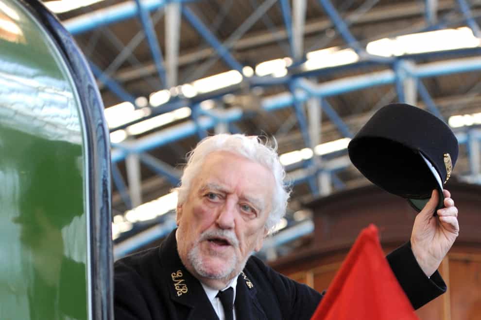 Bernard Cribbins arriving at Waterloo Station, London onboard the 66 tonne Stirling Single, the train used in the original Railway Children film. Veteran actor Bernard Cribbins, who narrated The Wombles and starred in the film adaptation of The Railway Children, has died aged 93, his agent said (Anthony Devlin/PA)