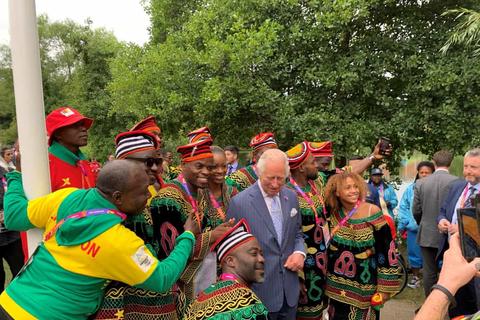 Prince Charles poses for a group photo with athletes from Cameroon (Richard Vernalls/PA)