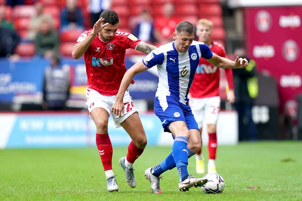 Charlie Wyke (right) is an injury doubt for Wigan (Tess Derry/PA)