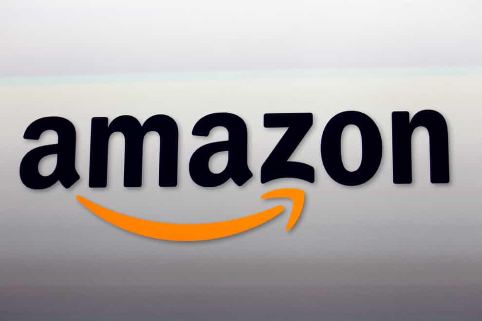 Amazon on Thursday reported its second-consecutive quarterly loss but its revenue topped Wall Street expectations, sending its stock sharply higher (Reed Saxon/AP)
