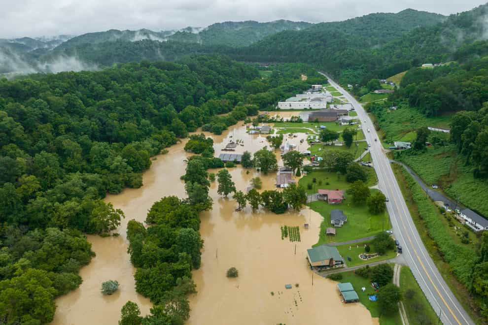 Homes were flooded near Quicksand, Kentucky (Ryan Hermens/Lexington Herald-Leader via AP)