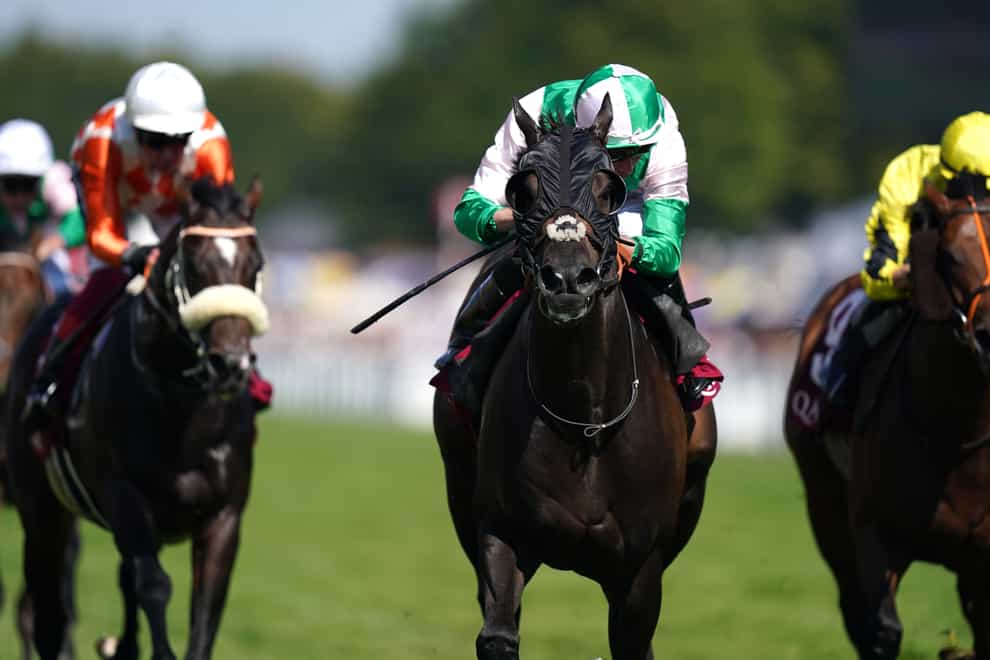Khaadem ridden by Ryan Moore (centre) wins The King George Qatar Stakes on day four of the Qatar Goodwood Festival 2022 at Goodwood Racecourse, Chichester. Picture date: Friday July 29, 2022.