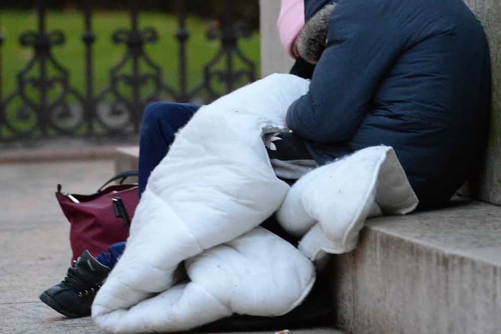 Homeless people sleep in Victoria, central London (Nick Ansell/PA)