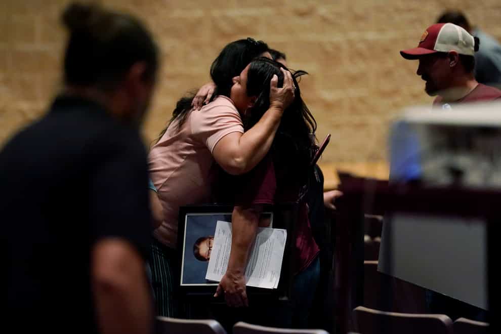 Texas Governor Greg Abbott has said that he stopped at a campaign fundraiser following the deadly school shooting in Uvalde and ‘let people know’ he could not stay, but a newspaper reports that he was there for nearly three hours (Eric Gay/AP)