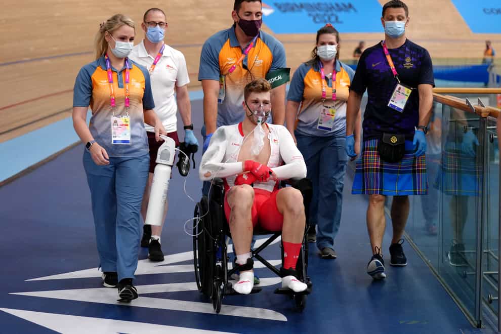 Joe Truman was helped from the track in a wheelchair after a frightening crash (John Walton/PA)