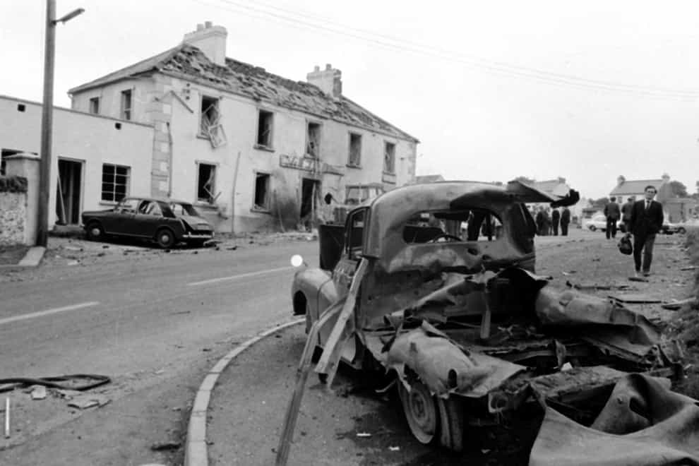 The scene outside the Beavpont Arms, in the Co Londonderry village of Claudy on July 31, 1972, after three car bombs exploded killing nine people (PA)