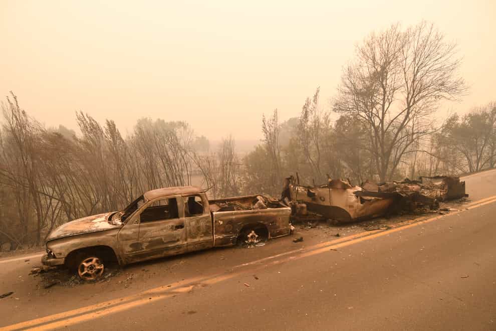 A pick-up truck and trailer destroyed by the McKinney fire in the community of Klamath River, California (Scott Stoddard/Grants Pass Daily Courier/AP)
