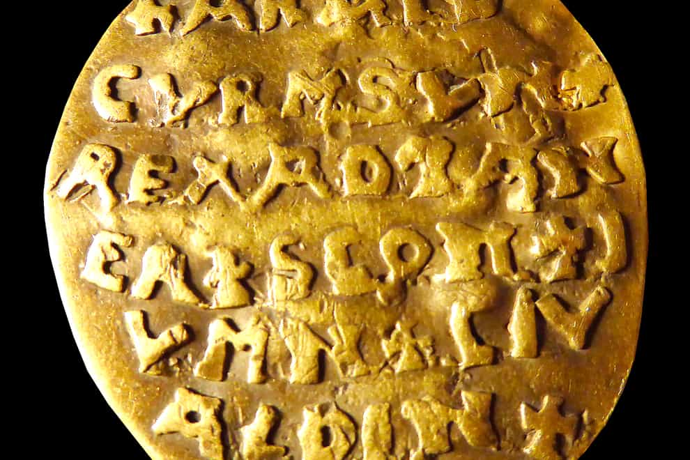 The 10th century golden Curmsun disc with the name of Danish King Harald ‘Bluetooth’ Gormsson on it (Sven Rosborn/AP)