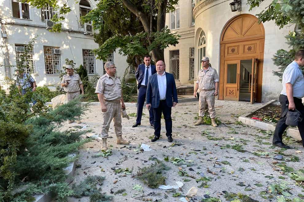 Governor of Sevastopol Mikhail Vladimirovich Razvozhayev at the scene of the explosion (Sevastopol mayor Mikhail Razvozhaev telegram channel via AP)