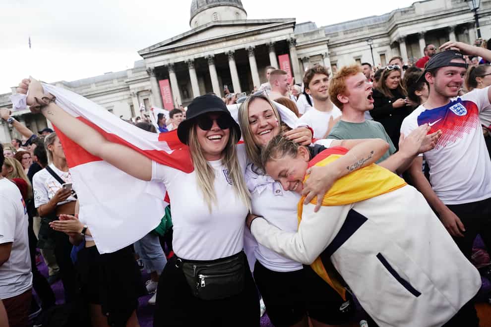 Fans celebrate the final whistle in Trafalgar Square (Aaron Chown/PA)