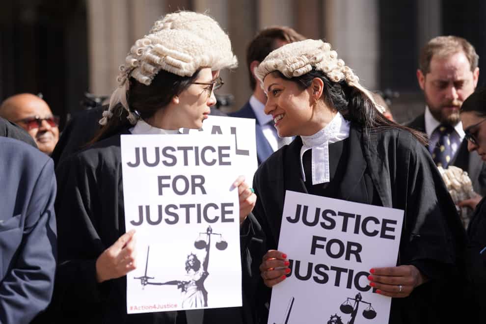 Criminal defence barristers outside the Royal Courts of Justice in London during a previous strike (Kirsty O’Connor/PA)