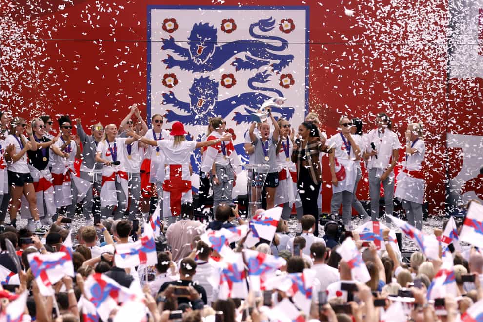 Beth Mead lifts the trophy during a fan celebration to commemorate England’s Euro 2022 triumph in Trafalgar Square (Steven Paston/PA)