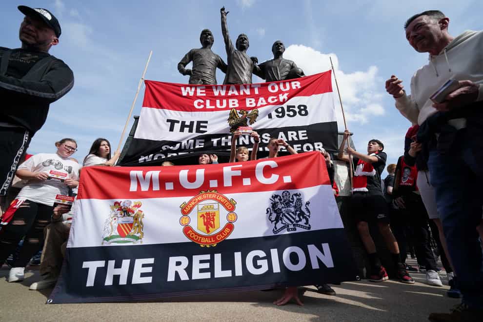 Manchester United fans are to be balloted on the creation of a Fan Share scheme (Jacob King/PA)