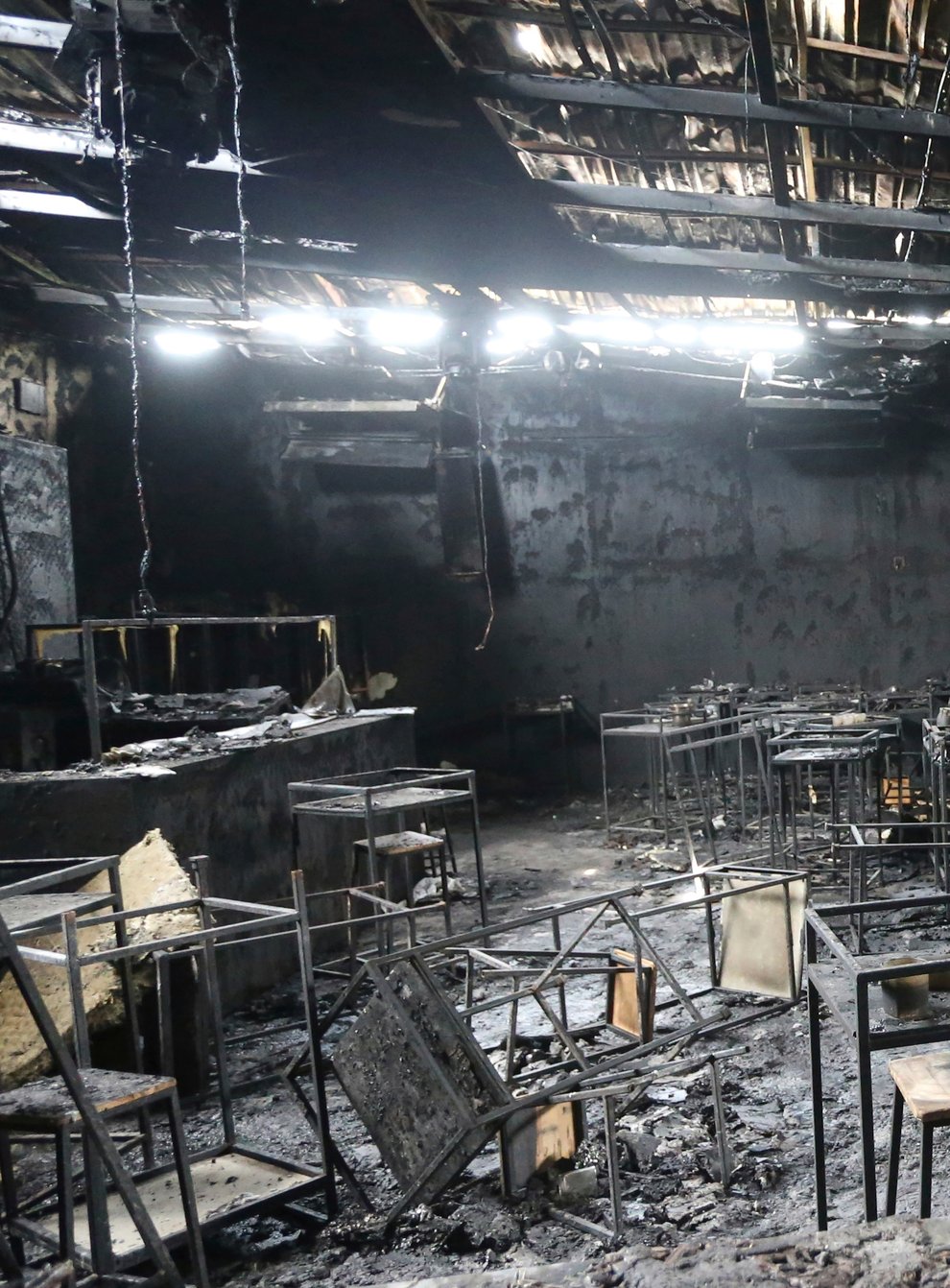Major fire damage fills the interior at the Mountain B pub in the Sattahip district of Chonburi province (AP)