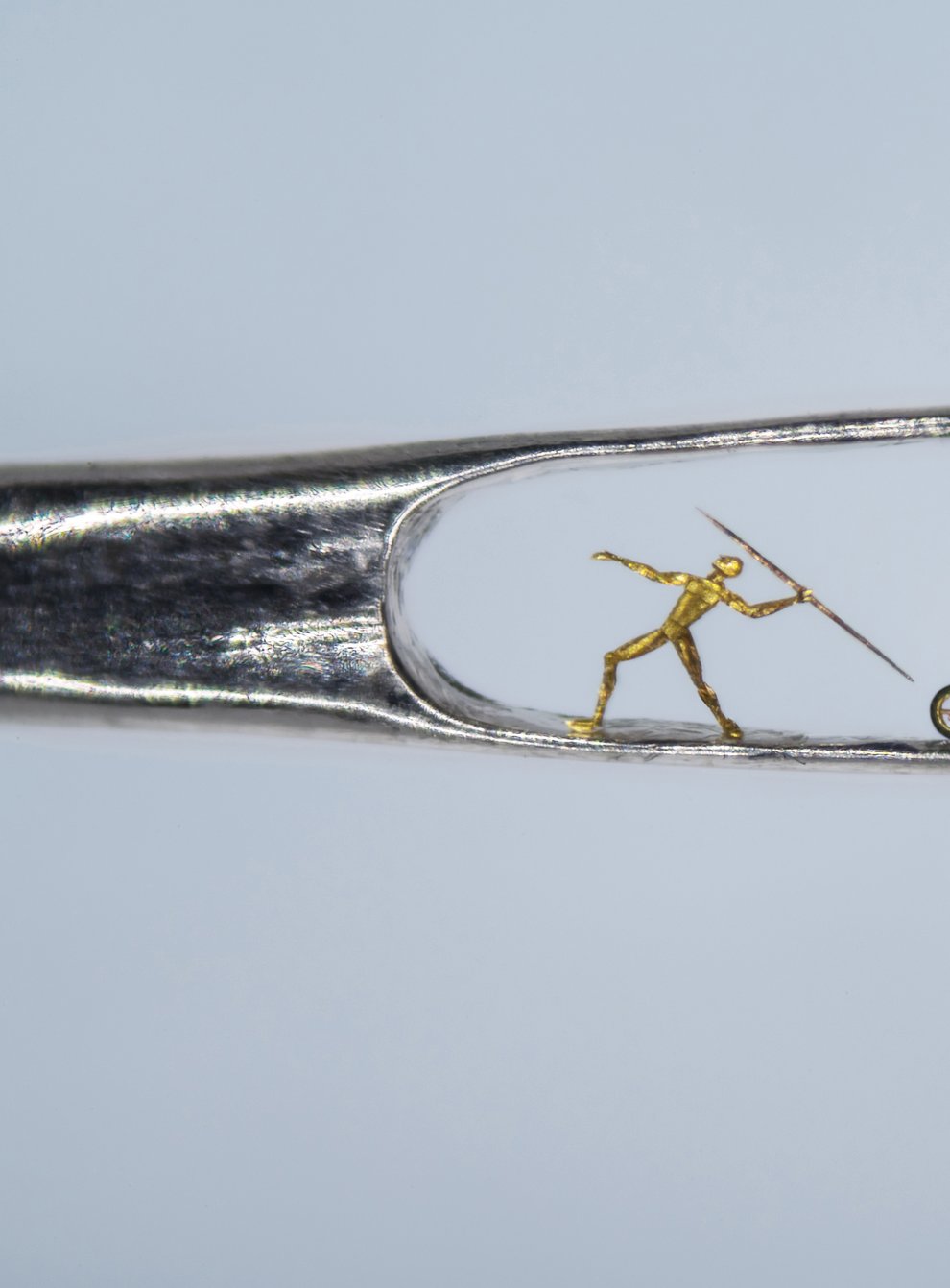 Dr Willard Wigan’s Aim for Gold Commonwealth Games tribute, set within the eye of a needle (Dr Willard Wigan/PA)