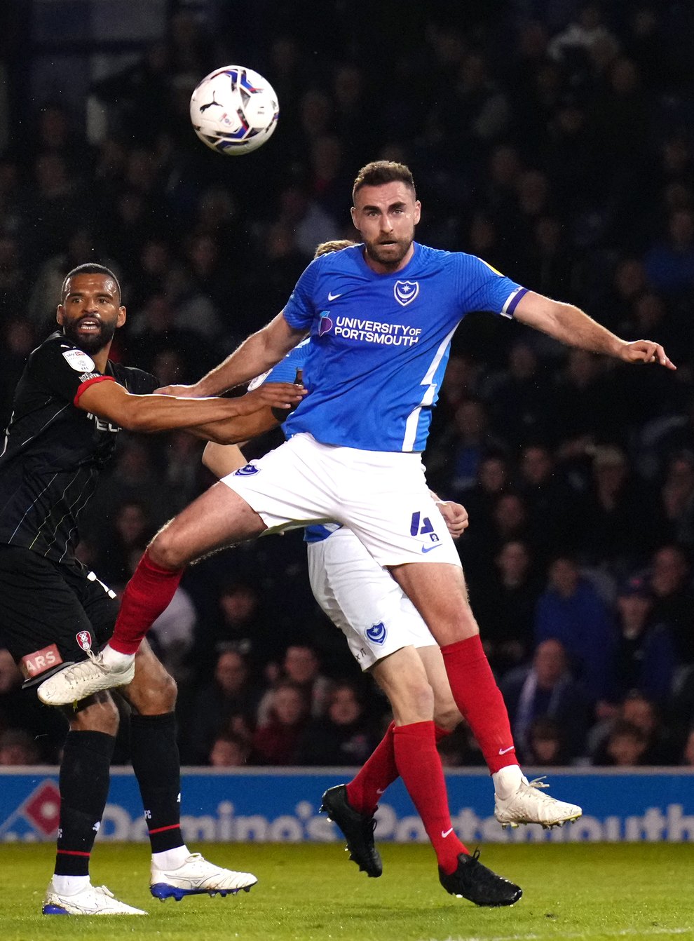 Portsmouth captain Clark Robertson (right) has been carrying a foot problem (John Walton/PA)
