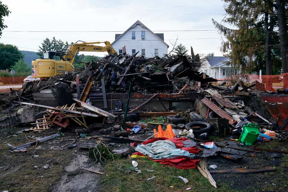A house that was destroyed by a fatal fire in Nescopeck, Pennsylvania (Matt Rourke/AP)
