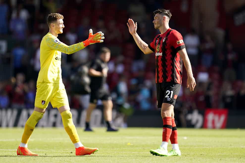 Bournemouth goalkeeper Mark Travers (left) and Kieffer Moore celebrate after the win over Aston Villa (Andrew Matthews/PA)