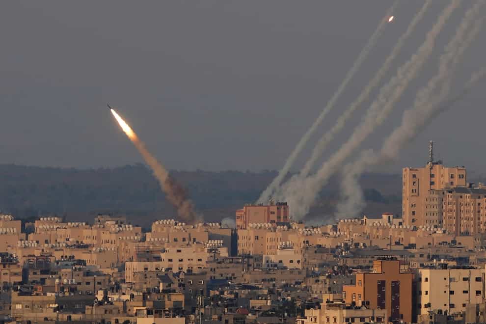 Rockets are launched from the Gaza Strip towards Israel, in Gaza City, Sunday, August 7, 2022 (Hatem Moussa/AP/PA)