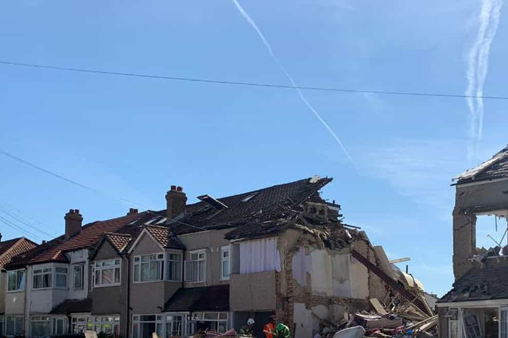 The scene in Galpin’s Road in Thornton Heath, south London, where three people were rescued after a house collapsed (London Fire Brigade /PA)