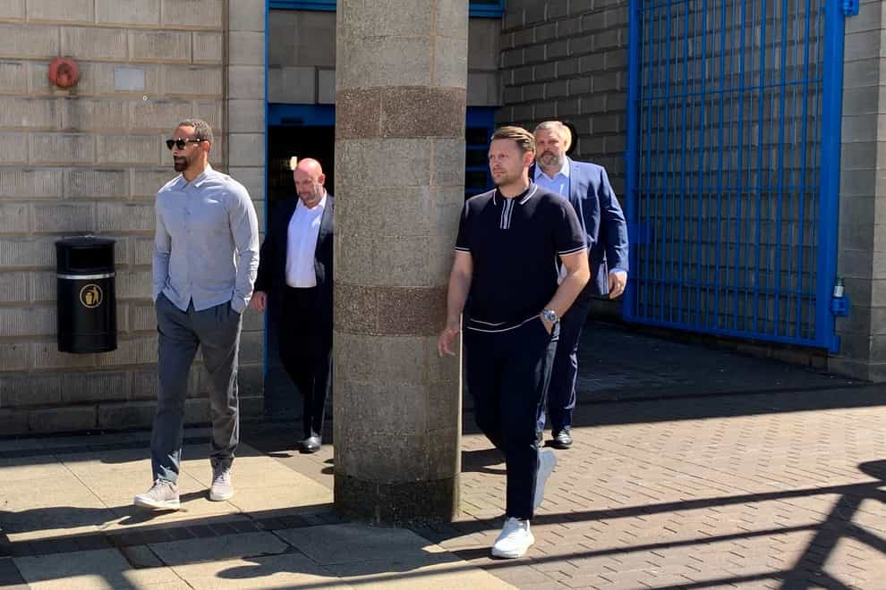 Ex England and Manchester United defender Rio Ferdinand (left) leaving Wolverhampton Crown Court. (Richard Vernalls/PA)