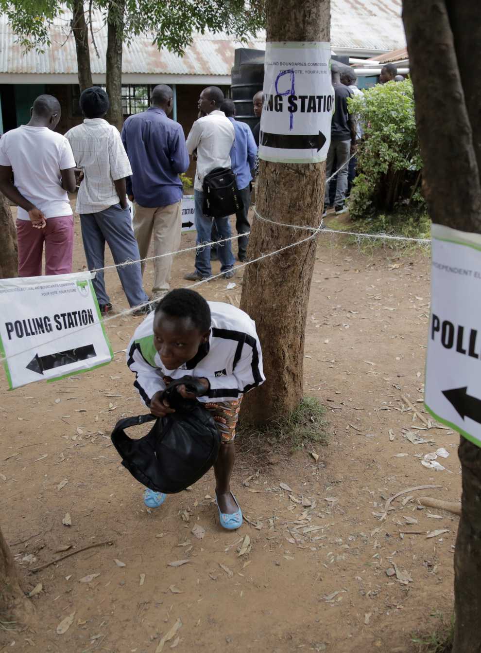 People line up to cast their vote in Kenya’s general election (Brian Inganga/AP)