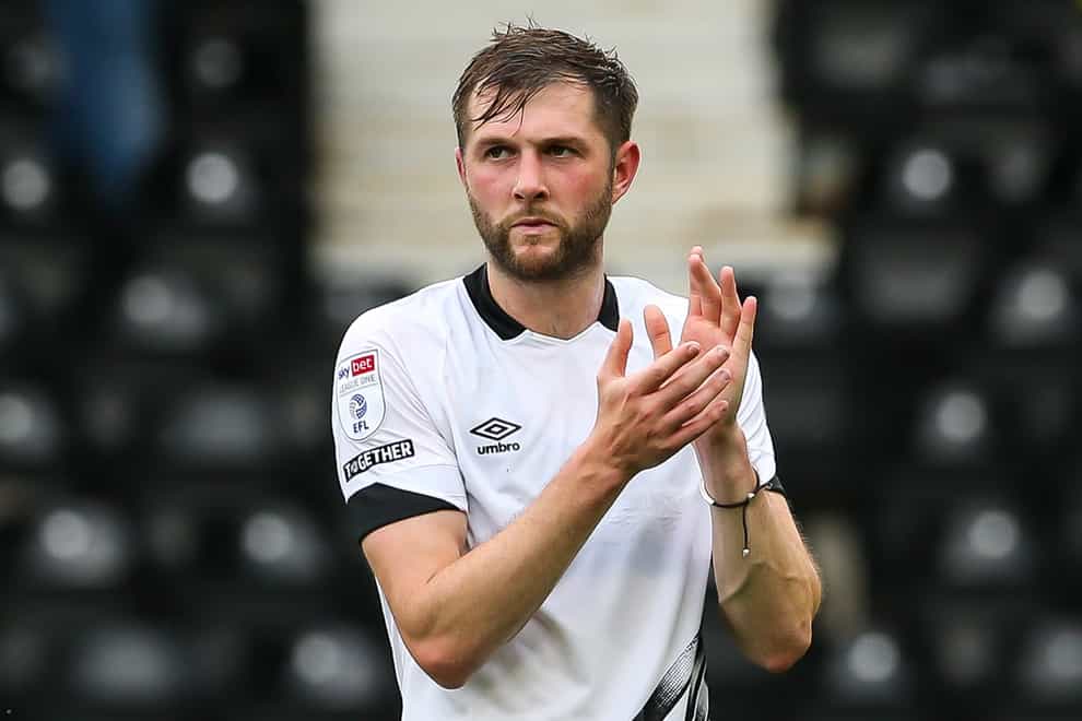 Tom Barkhuizen’s header sent Derby through after a 2-1 win over Mansfield (Barrington Coombs/PA)